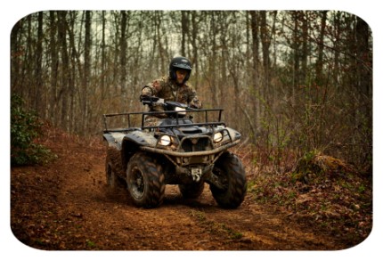 riding through trails on a atv